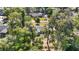 Aerial view of home showing roof, mature landscaping, and neighborhood at 1812 Se 38Th Ave, Ocala, FL 34471