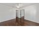 Bedroom features hardwood floors and multiple doorways at 1812 Se 38Th Ave, Ocala, FL 34471