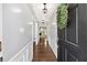 Inviting entryway with hardwood floors and decorative wainscoting at 1812 Se 38Th Ave, Ocala, FL 34471