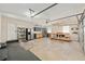 Spacious garage featuring workbench and ample storage at 1812 Se 38Th Ave, Ocala, FL 34471