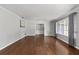 Bright and airy living room featuring hardwood floors and seamless access to other living spaces at 1812 Se 38Th Ave, Ocala, FL 34471