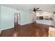 Open-concept space includes a kitchen and view of the living room fireplace at 1812 Se 38Th Ave, Ocala, FL 34471