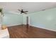 Living room featuring hardwood floors and a view of the hallway at 1812 Se 38Th Ave, Ocala, FL 34471