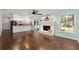 Living room featuring a fireplace and sliding glass doors leading to a patio at 1812 Se 38Th Ave, Ocala, FL 34471