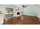 Well-lit living room with sliding glass door access to the screened patio at 1812 Se 38Th Ave, Ocala, FL 34471