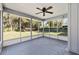 Enjoy the outdoors in this spacious screened-in porch, perfect for relaxation and entertainment at 1812 Se 38Th Ave, Ocala, FL 34471