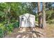 Durable storage shed in a backyard setting, offering ample space for tools and equipment at 1812 Se 38Th Ave, Ocala, FL 34471