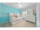 Inviting bedroom with a trundle bed, dresser, and plenty of natural light, a serene retreat at 2 Hemlock Trace Run, Ocala, FL 34472