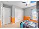 Bright bedroom features a bunkbed, closet, and colorful accents, creating a fun space at 2 Hemlock Trace Run, Ocala, FL 34472