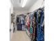 Walk-in closet with ample hanging space for clothing and accessories at 2 Hemlock Trace Run, Ocala, FL 34472