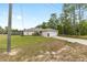 Beautiful home with a well-manicured lawn and tidy landscaping that enhances the property's curb appeal at 2 Hemlock Trace Run, Ocala, FL 34472