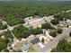 New construction homes are nestled on a lot with mature trees along a quiet rural road at 22777 Sw Beach Blvd, Dunnellon, FL 34431