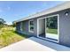 Covered porch with view of backyard at 22777 Sw Beach Blvd, Dunnellon, FL 34431