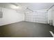 Large two car garage with door and epoxy floor at 22777 Sw Beach Blvd, Dunnellon, FL 34431