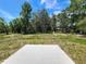 A large property lot is cleared and ready for building amidst beautiful greenery in a secluded area at 22777 Sw Beach Blvd, Dunnellon, FL 34431