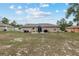Expansive backyard featuring a patio perfect for outdoor dining and entertaining at 2690 Sw 154Th Ln, Ocala, FL 34473