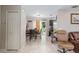 Open dining area featuring neutral walls, a sliding glass door, and a tile floor at 2690 Sw 154Th Ln, Ocala, FL 34473