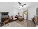 Bedroom with ceiling fan, window with curtains, and a view of the outside at 3880 Sw 6Th Ave, Ocala, FL 34471