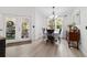 Dining room boasts chandelier lighting and lots of natural light at 3880 Sw 6Th Ave, Ocala, FL 34471