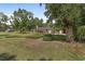 Well-maintained home with an expansive yard, mature trees and a storage shed at 3880 Sw 6Th Ave, Ocala, FL 34471