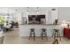 Kitchen featuring dark cabinets and breakfast bar seating area at 3880 Sw 6Th Ave, Ocala, FL 34471