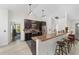 Kitchen boasts granite counters, stainless appliances, and breakfast bar at 3880 Sw 6Th Ave, Ocala, FL 34471