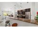 Kitchen with breakfast bar, granite countertops, and stainless appliances at 3880 Sw 6Th Ave, Ocala, FL 34471
