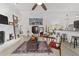 Living room boasts vaulted ceilings, fireplace and wood flooring at 3880 Sw 6Th Ave, Ocala, FL 34471