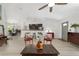 Open concept living room with breakfast bar, stylish furnishings, and lots of natural light at 3880 Sw 6Th Ave, Ocala, FL 34471