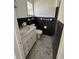 Bathroom featuring a marble vanity, toilet, and tiled shower showcases modern finishes at 4000 Sw 6Th Ave, Ocala, FL 34471