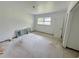 Bright bedroom offers a blank canvas ready for updates with a window and closet at 4000 Sw 6Th Ave, Ocala, FL 34471