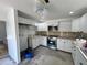 Updated kitchen with new white cabinets, modern appliances, and lots of counter space at 4000 Sw 6Th Ave, Ocala, FL 34471