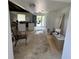 Living room with an open floor plan and plenty of natural light. Ready for renovation at 4000 Sw 6Th Ave, Ocala, FL 34471