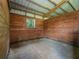 Empty wooden stall inside the barn at 402 Sw 127Th Pl, Ocala, FL 34473
