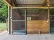 Wooden stall with metal gate inside the barn at 402 Sw 127Th Pl, Ocala, FL 34473