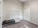 Empty bedroom with leather chaise lounge and double closet perfect for furnishing to your liking at 402 Sw 127Th Pl, Ocala, FL 34473