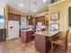 Well-equipped kitchen with custom cabinetry, stainless steel appliances, and granite countertops at 402 Sw 127Th Pl, Ocala, FL 34473