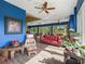 Spacious living area featuring hardwood floors, comfortable sofas, and bright lighting at 402 Sw 127Th Pl, Ocala, FL 34473