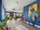 Open living room featuring hard wood-look floors, bright walls, and lots of space at 402 Sw 127Th Pl, Ocala, FL 34473