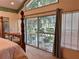 Bedroom featuring a sliding door and view of the backyard at 4305 Sw 20Th Ave, Ocala, FL 34471