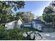 Contemporary two-story home with a three-car garage and lush landscaping at 4305 Sw 20Th Ave, Ocala, FL 34471