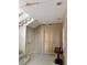 Hallway with carpeted stairs, light-colored walls, and decorative accents at 4305 Sw 20Th Ave, Ocala, FL 34471