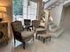 Cozy living room with matching chairs and a view of the staircase at 4305 Sw 20Th Ave, Ocala, FL 34471