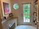 Office featuring a granite counter, white cabinets, and backyard view at 4305 Sw 20Th Ave, Ocala, FL 34471