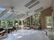 Bright sunroom filled with natural light streaming through large windows and skylights at 4305 Sw 20Th Ave, Ocala, FL 34471