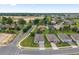An aerial view showcases a well-maintained neighborhood with manicured lawns and attractive single-Gathering homes at 4892 Nw 39Th Loop, Ocala, FL 34482