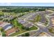Aerial view of a residential community showcasing its layout, streets, and green spaces at 4892 Nw 39Th Loop, Ocala, FL 34482
