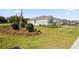 Lush lawn and landscaping surround this single-story home, enhancing its curb appeal and creating a welcoming atmosphere at 4892 Nw 39Th Loop, Ocala, FL 34482