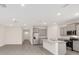 Spacious open layout with an island, stainless appliances, and ample natural light at 4892 Nw 39Th Loop, Ocala, FL 34482