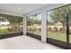 This spacious lanai offers a seamless transition to the outdoors with its screened enclosure and views of the lush surroundings at 4892 Nw 39Th Loop, Ocala, FL 34482